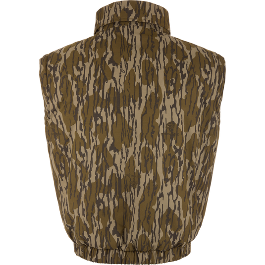 Throwback 80 Sport Vest from Purewhitelaneshop, featuring a camouflage pattern, stand-up collar, elastic waistband, and large accessory pockets, ideal for outdoor adventures.