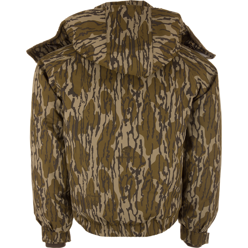 Back view of the Throwback 80 Sport 3-in-1 Jacket with a tiger-stripe camo pattern, featuring a hood, ribbed cuffs, and hem for versatile all-weather protection.