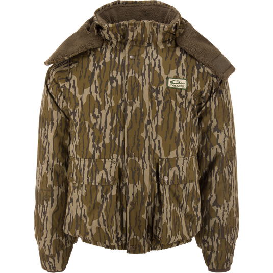 Throwback 80 Sport 3-in-1 Jacket with woodland camo, removable hood, high fleece collar, snap-button closure, and large front pockets, ideal for outdoor adventures.