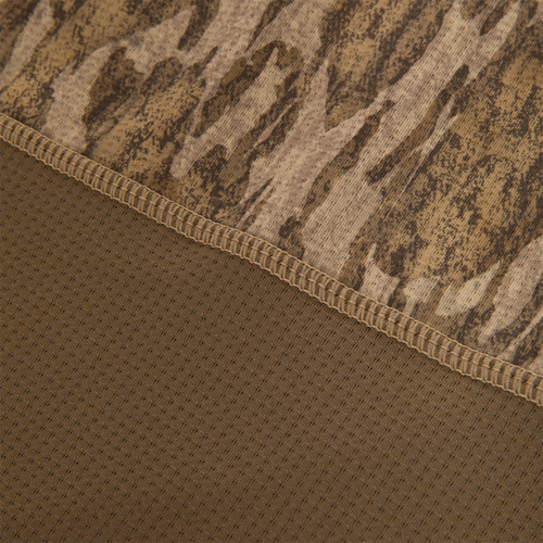 Close-up of the EST Offset 1.0 Half Zip Pullover, showing brown camouflage knit and perforated mesh fabric with overlock stitching for breathability and comfort.
