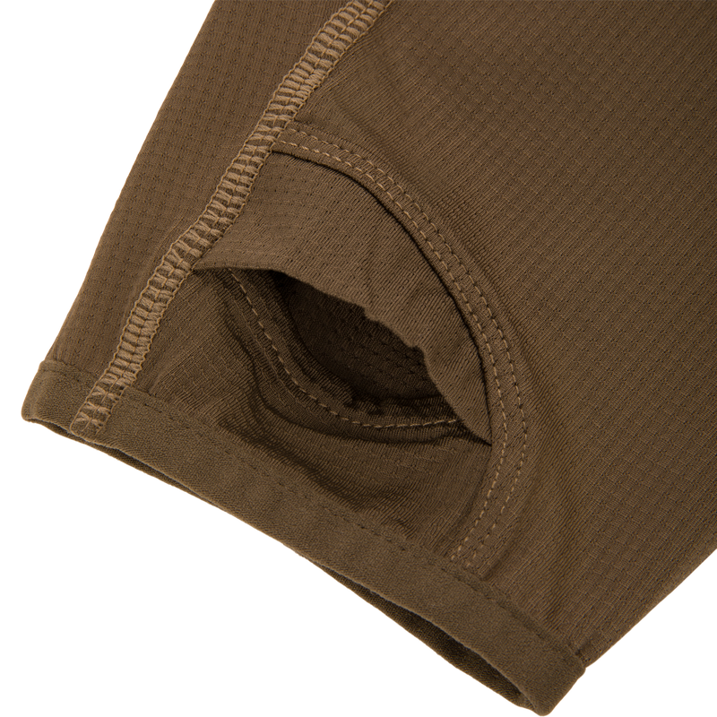 Close-up of the EST Offset 1.0 Half Zip Pullover, highlighting its waffle-knit texture and reinforced stitching, designed for comfort and performance in hunting and outdoor activities.