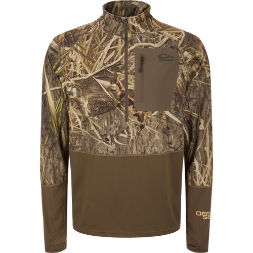 EST Offset 1.0 Half Zip Pullover in Mossy Oak Habitat camo with Drake logo, thumb-slot cuffs, and zippered chest pocket, designed for hunting concealment and comfort.