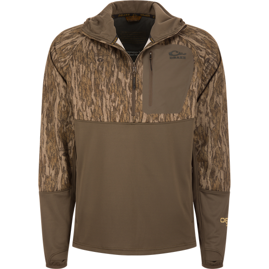 MST Offset 2.0 Half Zip Hoodie with tree-bark camouflage upper, solid brown lower, zippered chest pocket, and thumb-loop sleeves, designed for hunting comfort and functionality.