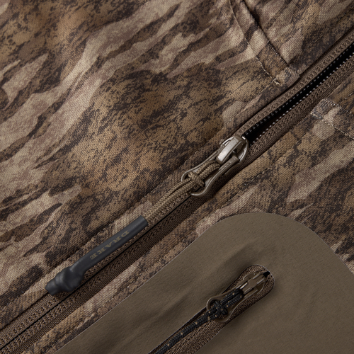 Close-up of MST Offset 2.0 Half Zip Hoodie showing dual zippers with Drake branded paracord pulls on camo-patterned fabric, highlighting its rugged design.