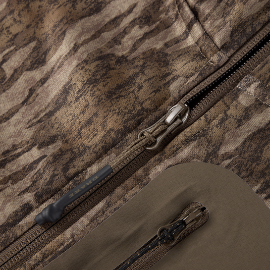 Close-up of MST Offset 2.0 Half Zip Hoodie showing dual zippers with Drake branded paracord pulls on camo-patterned fabric, highlighting its rugged design.