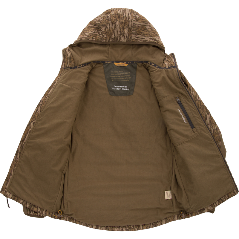 LST BMF Jacket with Primaloft, showcasing camo-patterned hood, zip-out lining with branding, stash pocket, and drawcord, designed for versatile, water-resistant hunting use.
