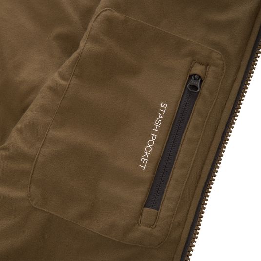 Close-up of the LST BMF Vest with Primaloft, highlighting the stash pocket with a black zip closure, emphasizing its functional design for versatile layering.