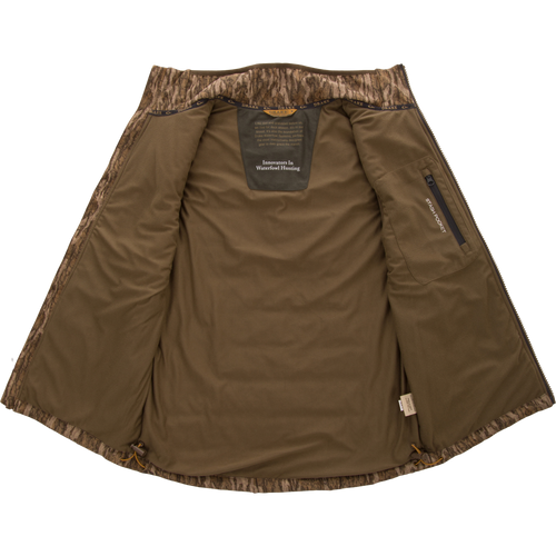LST BMF Vest with Primaloft features an olive-green fleece body, camo trim, zippered stash pocket, and Innovators In Waterfowl Hunting patch, ideal for layering.