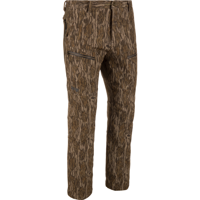 MST CommandXT Softshell Pant in camouflage pattern, featuring articulated knees, zippered thigh pockets, and stretch waistband for mobility, crafted from windproof, water-resistant softshell material with reinforced seat.