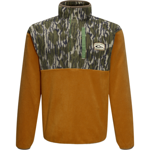 Camp Fleece Limited Edition Snap Pullover with camo-patterned chest, warm brown body, and Camp Fleece Greenwing patch, featuring open pockets and a half-zip placket.