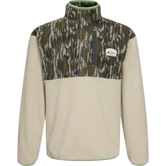 Camp Fleece Limited Edition Snap Pullover featuring camo yoke, high collar, chest pocket, and open side pockets, designed for warmth and comfort in outdoor settings.