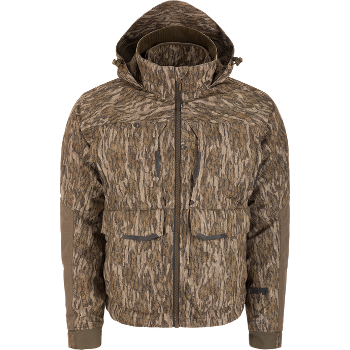 LST CommandXT 3-in-1 PrimaLoft Insulated Jacket, featuring a camo pattern, adjustable hood, articulated sleeves, multiple pockets, and a durable, weatherproof design ideal for hunting.