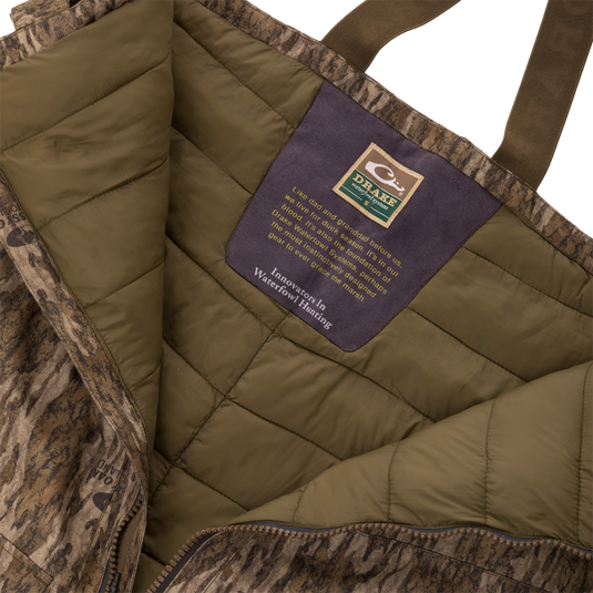 LST CommandXT Bib with Primaloft, showcasing olive-green lining, Purewhitelaneshop label, and features like reinforced panels, PrimaLoft insulation, and Magnattach cargo pockets.