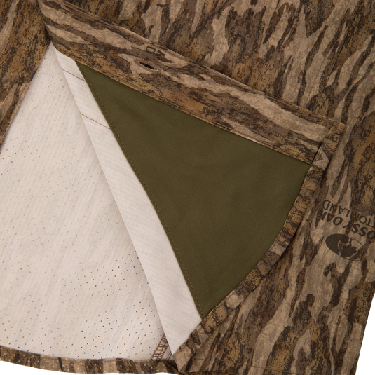 EST Wingshooter Trey Long Sleeve Shirt with vented back, multiple pockets, and hidden button-down collar, designed for outdoor activities with UPF 30 protection and moisture-wicking fabric.