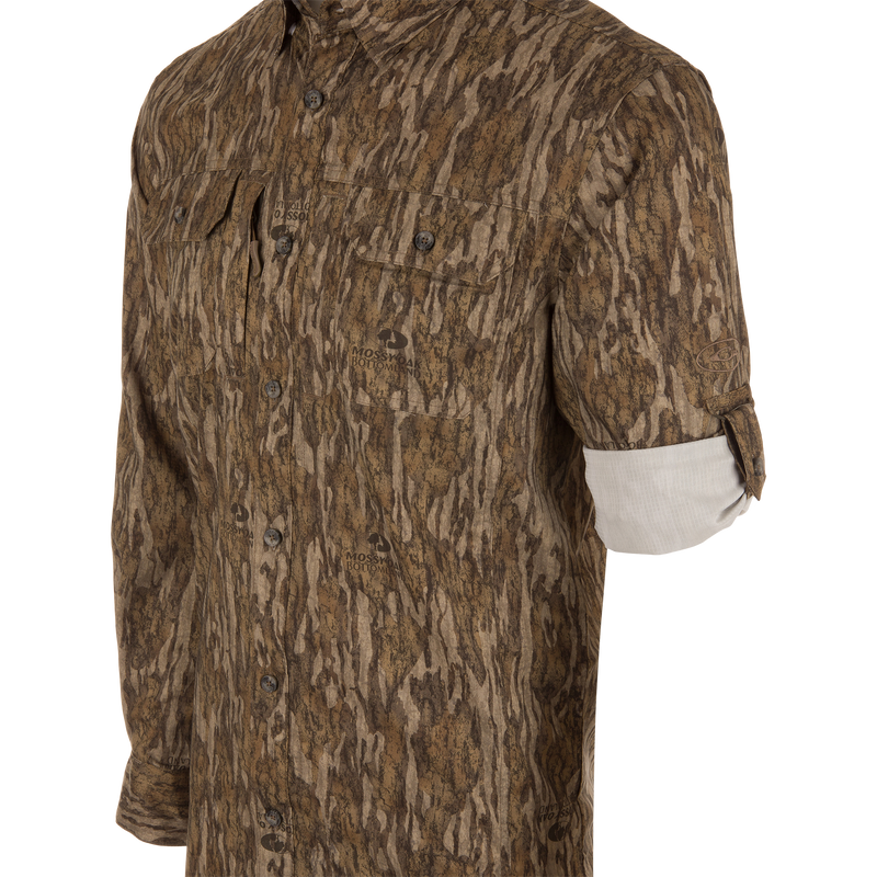 EST Wingshooter Trey Long Sleeve Shirt displayed with vented back, multiple pockets, and hidden button-down collar, ideal for outdoor activities with UPF 30 protection.