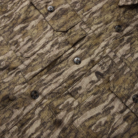 EST Wingshooter Trey Long Sleeve Shirt with vented back, multiple pockets, and hidden button-down collar, designed for outdoor activities with UPF 30 protection and quick-drying fabric.