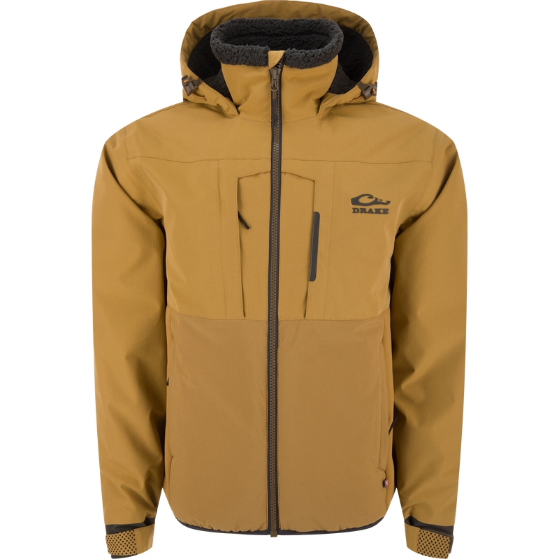 LST BMF Eqwader Full Zip with Primaloft: Insulated jacket featuring zippered chest pockets, adjustable cuffs, and fleece-lined hood, ideal for cold-weather outdoor activities.