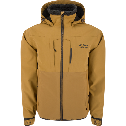 LST BMF Eqwader Full Zip with Primaloft: Insulated jacket featuring zippered chest pockets, adjustable cuffs, and fleece-lined hood, ideal for cold-weather outdoor activities.