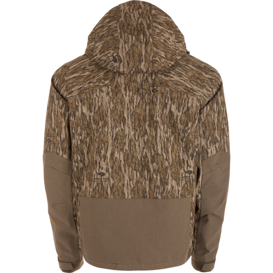 Back view of the LST BMF Pit Jacket with Mossy Oak Bottomland camo, solid brown accents, adjustable hood and cuffs, engineered for extreme weather conditions.