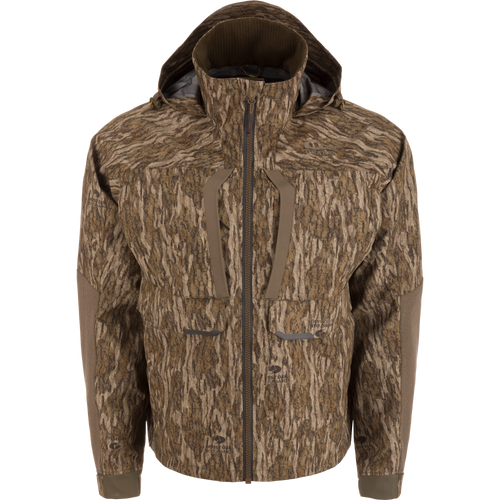 LST BMF Pit Jacket in woodland camo, featuring articulated elbows, adjustable hood, and multiple pockets, designed for extreme weather hunting with durable, weather-resistant materials.
