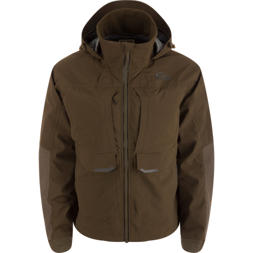 LST BMF Pit Jacket with high collar, hood, reinforced elbows, and multiple zippered pockets designed for extreme weather protection and durability.