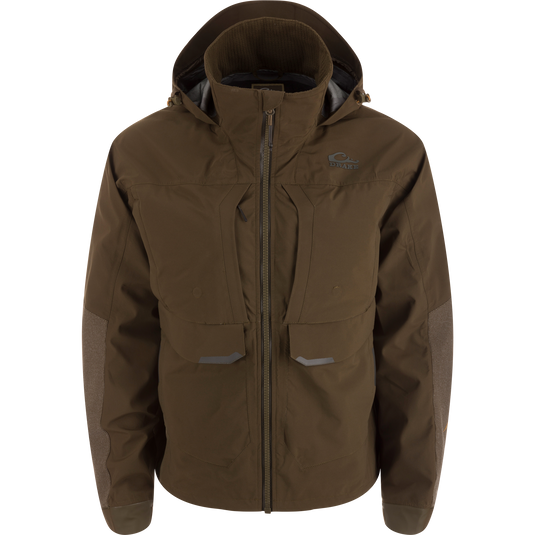 LST BMF Pit Jacket with high collar, hood, reinforced elbows, and multiple zippered pockets designed for extreme weather protection and durability.