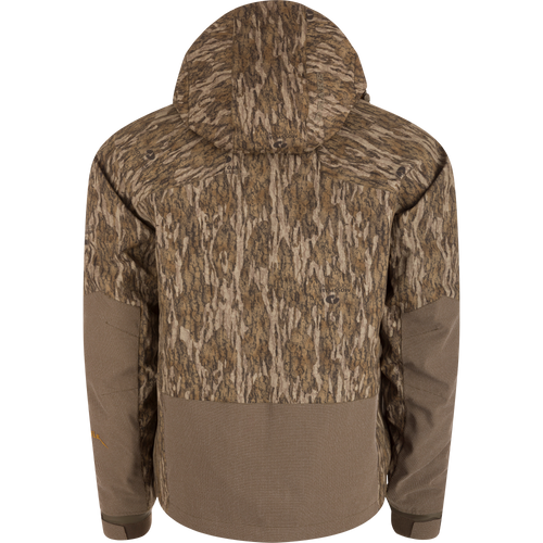 Back view of the LST BMF 3-in-1 Pit Jacket with Primaloft, featuring a Bottomland camouflage pattern and waffle-textured brown accents on hem and forearms.