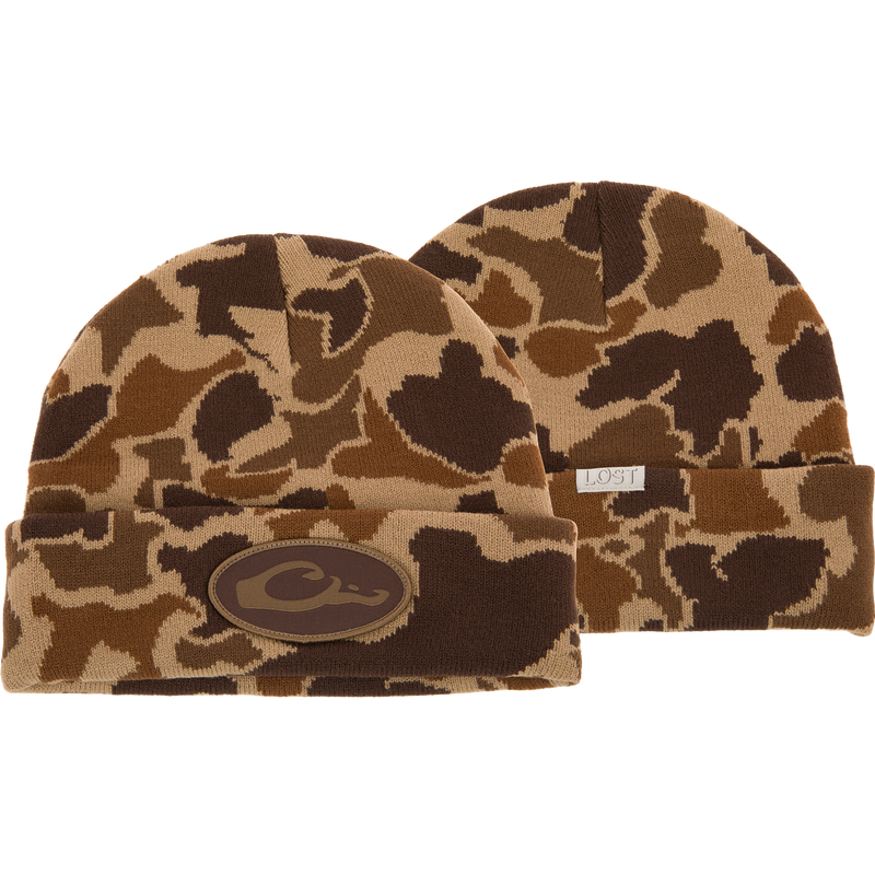 Drake X LOST Cold Front Watch Cap featuring camouflage and logo designs with a brown patch, jacquard construction, and a 4 flip cuff for warmth and style.