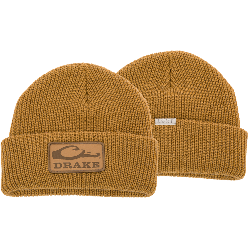 Drake X LOST Cold Front Watch Cap featuring a prominent logo, showcasing jacquard construction and a 4 flip cuff for warmth and durability.