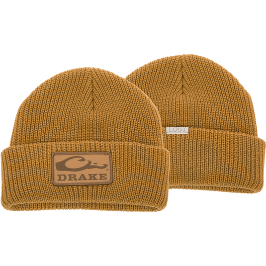 Drake X LOST Cold Front Watch Cap featuring a prominent logo, showcasing jacquard construction and a 4 flip cuff for warmth and durability.