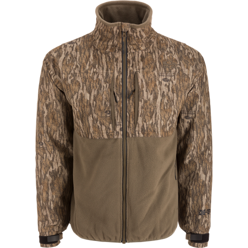 MST CommandXT Eqwader Full Zip Jacket with camouflage upper and olive-brown fleece lower, features zippered chest pockets and adjustable cuffs for outdoor enthusiasts.