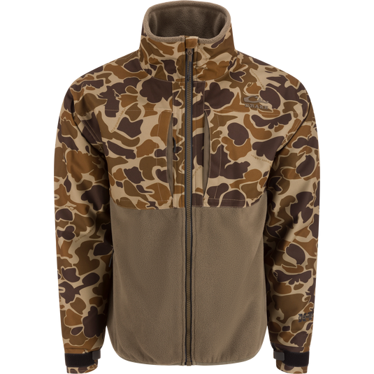 MST CommandXT Eqwader Full Zip Jacket with camouflage upper, solid fleece lower, zippered chest pockets, and adjustable cuffs, designed for rugged outdoor use.