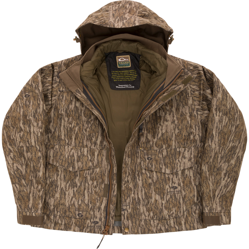LST Hardline 3-in-1 Jacket with Mossy Oak camo, featuring waterproof shell, ergonomic design, and ample pockets, ideal for adaptable waterfowl hunting protection.
