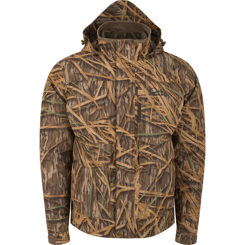 LST Hardline 3-in-1 Jacket in marsh camouflage, features multiple pockets, adjustable cuffs, and a zip closure, designed for versatile waterfowl hunting protection.
