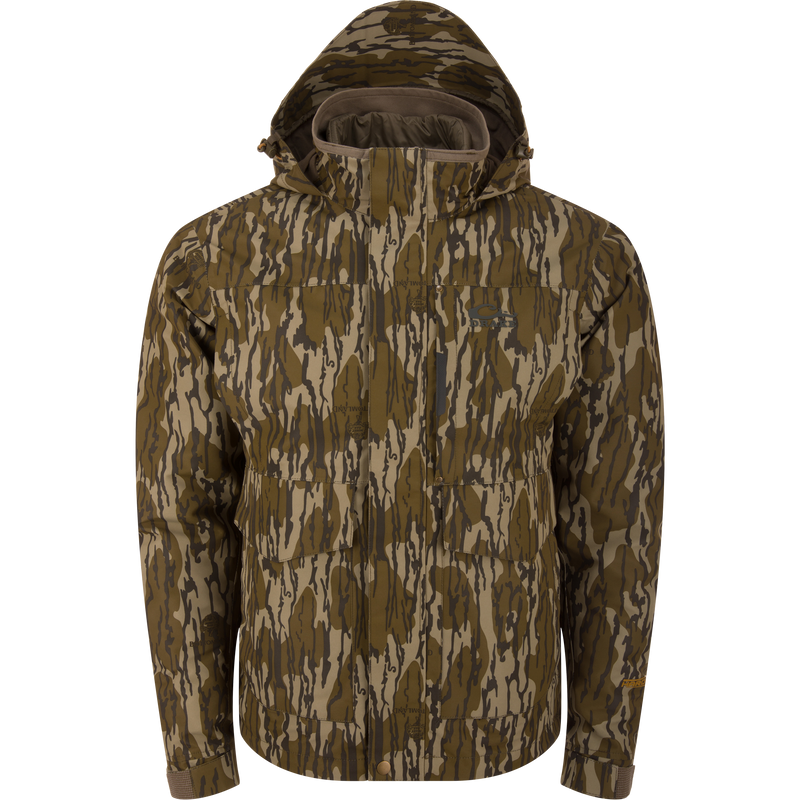 LST Hardline 3-in-1 Jacket with tree stripe camouflage, featuring a hood, adjustable cuffs, multiple pockets, and a versatile 3-layer waterproof shell for hunting.