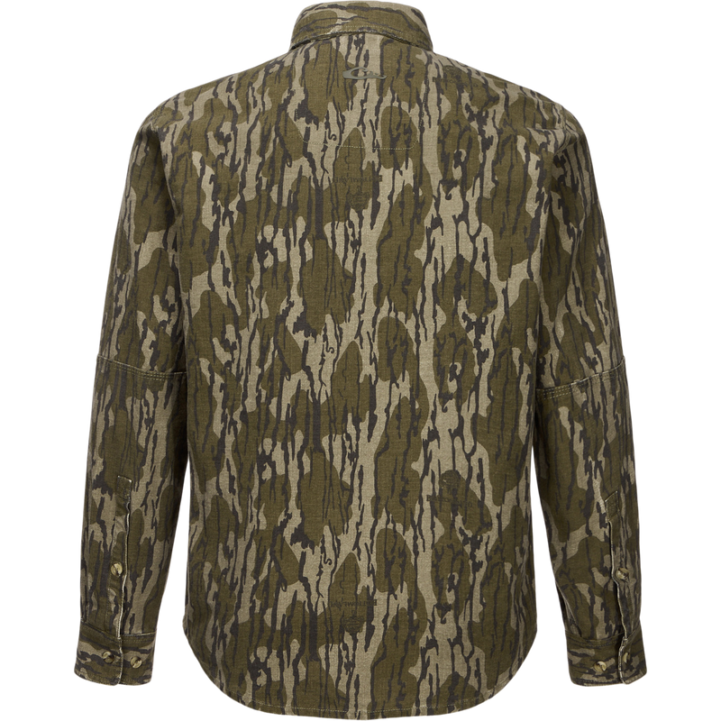 Throwback 80 Button Down Shirt in olive-gray camouflage, showcasing durable cotton twill, double-layered forearms, and triple-stitched seams, ideal for rugged outdoor activities.