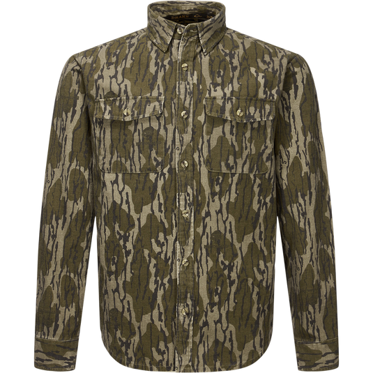 Throwback 80 Button Down Shirt with camouflage print, two chest flap pockets, and reinforced forearms, crafted from durable 8.3oz cotton twill, ideal for rugged outdoor wear.