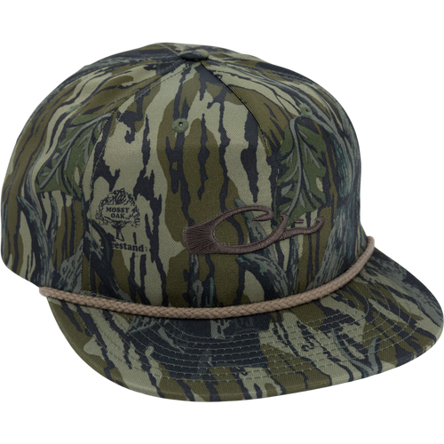Drake X Richardson 256XE Flatbill Cap features a green-brown “tiger stripe” camouflage, embroidered logo, braided bill rope, and snapback for adjustable fit.