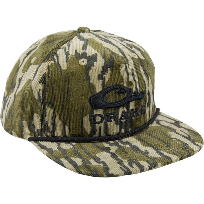 Drake X Lost Hat Goat Rope Corduroy Cap featuring camouflage corduroy, black-embroidered DRAKE logo, and paracord detail for stylish outdoor flair.