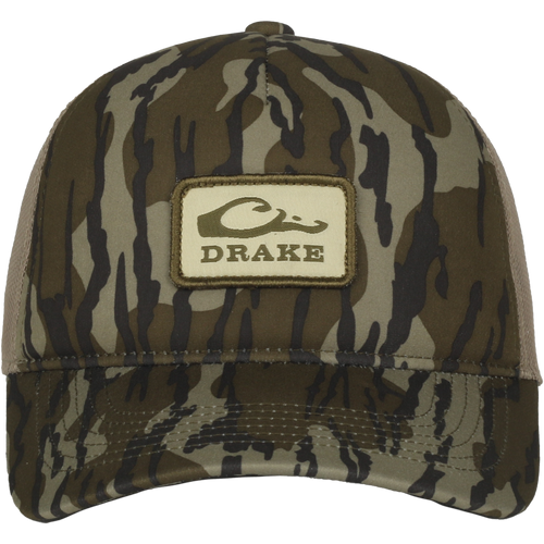 Foam Trucker Logo Cap with camo pattern, featuring a DRAKE patch. Offers a pre-curved visor, mesh back, and plastic snap closure for comfort and style.