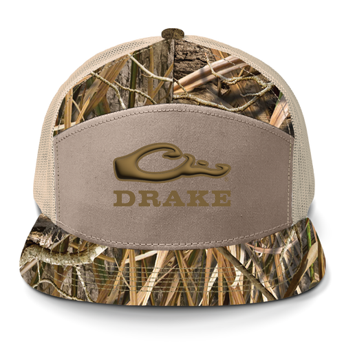 Drake X LOST SA7AGE 7 Panel Cap featuring a tan front with logo, camo print bill, and tan mesh back, designed for versatile, everyday wear.