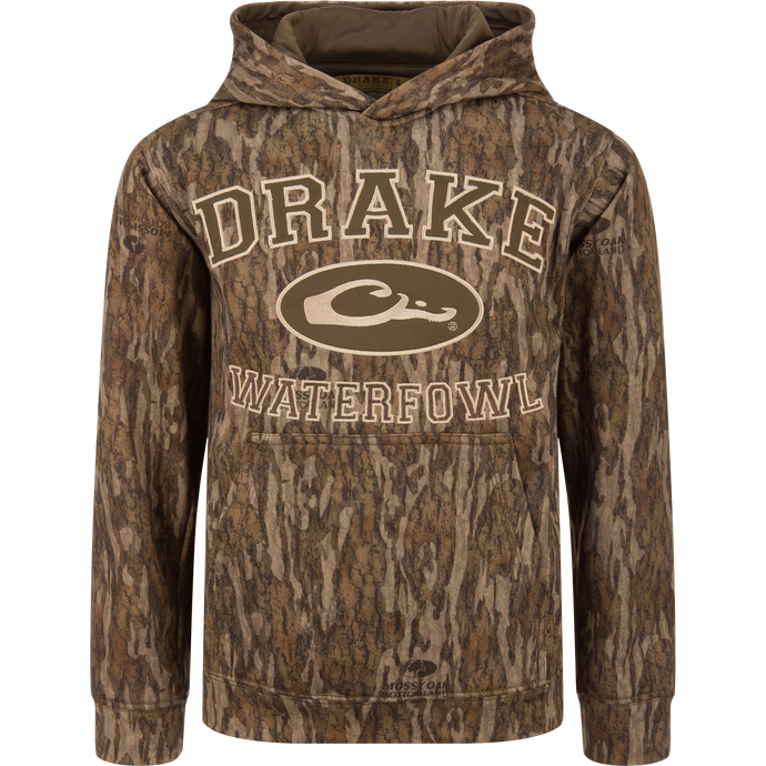 Youth Performance Hoodie with camo pattern, DRAKE branding, oval logo, kangaroo pocket, and lined hood for waterfowl hunting; features polyester/spandex anti-pilling fleece for flexibility.
