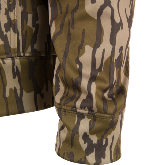 Close-up of the Performance 8-Shot Hoodie sleeve, showcasing camouflage pattern, durable stitching, and cuff, highlighting its stretch and anti-pilling fleece design.