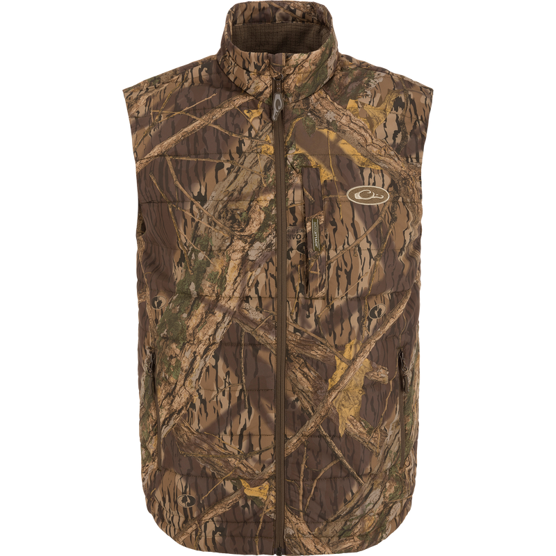 MST Synthetic Down Pack Vest with camouflage design, featuring a zipper, traditional baffle pattern, and synthetic down insulation, ideal for versatile hunting attire.