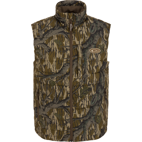 MST Synthetic Down Pack Vest featuring a camouflage pattern and logo, designed for warmth and packability, ideal for hunting with abrasion-resistant, matte-finish shell.