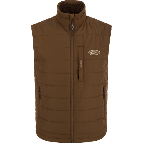 MST Synthetic Down Pack Vest with white logo, featuring horizontal baffle design and zippered chest pocket, ideal for layering and versatile outdoor use.