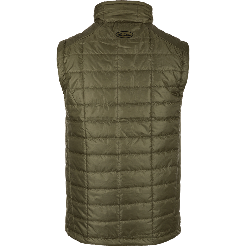 A close-up of the Synthetic Down Pac-Vest, a green puffy jacket with a water-repellent finish. Stay dry and protected with this 100% polyester shell, featuring YKK zippered side slash pockets and a drawcord waist. Perfect for outdoor adventures!