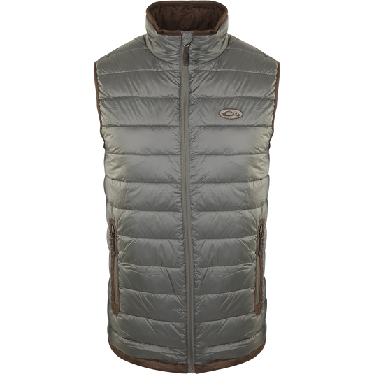 A silver-colored durable Synthetic Double Down Vest by Purewhitelaneshop, featuring a horizontal baffle design, suede accents, and reverse coil zippers for outdoor warmth and style.