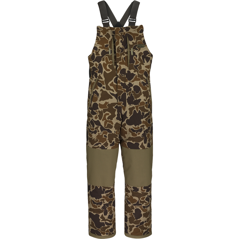LST Reflex Insulated Bib: Waterproof, windproof, and breathable overalls with adjustable straps, reinforced knees, and seat.