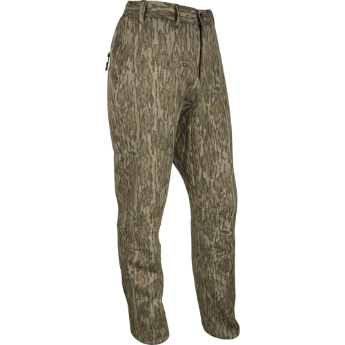 MST Ultimate Wader Pants with side zippers and elastic waist, designed for comfort under waders or casual wear. Features articulated knees and zippered pockets.